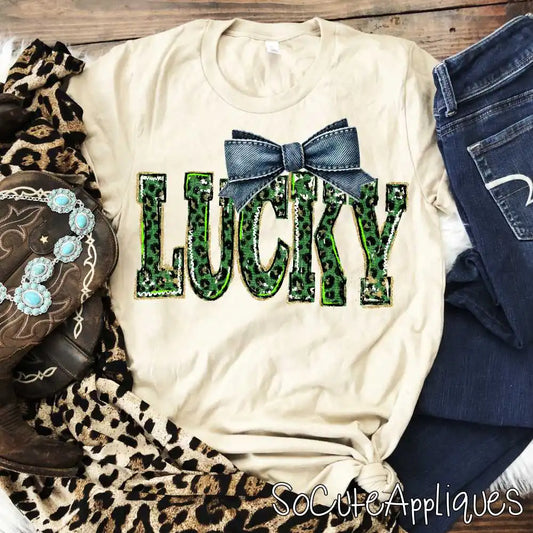LUCKY distresed gold green leopard denim bow