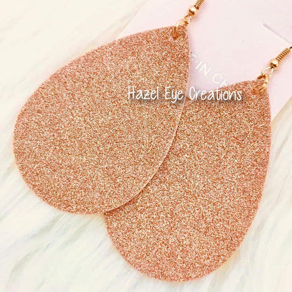 Faux leather hanging tear drop earrings